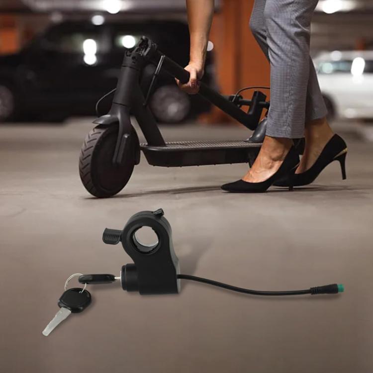 Ignition key switch lock on electric scooter with keys and cable