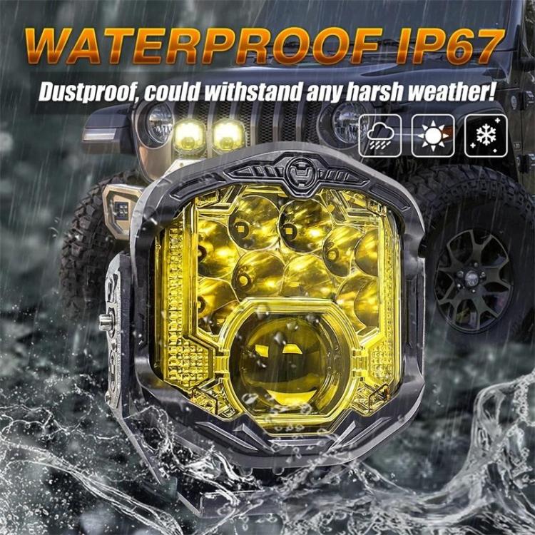 Rugged LED off-road headlight with amber halo ring and black housing.