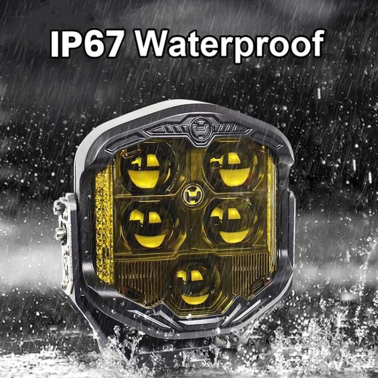 7-inch LED work light with yellow lens and rugged black frame, front view