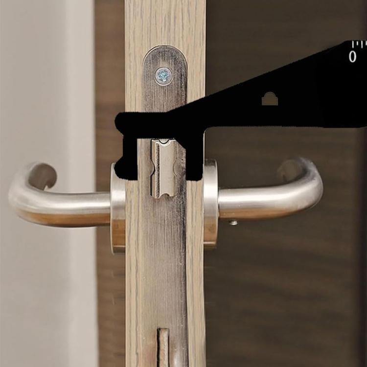 Door gap crowbar lever inserted between door and frame near handle