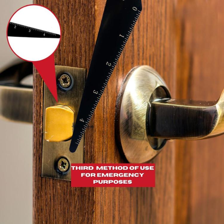 Door gap crowbar lever with measurement markings on wooden door