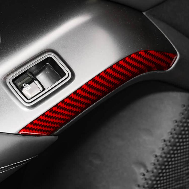 Red carbon-fiber look rear door lifting side strip near window switch