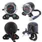 Retro motorcycle gauge cluster with round meter, wiring harness, and black mounting bracket