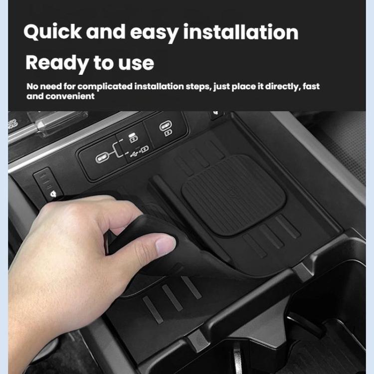 Black silicone charging mat installed in center console, two charging pads