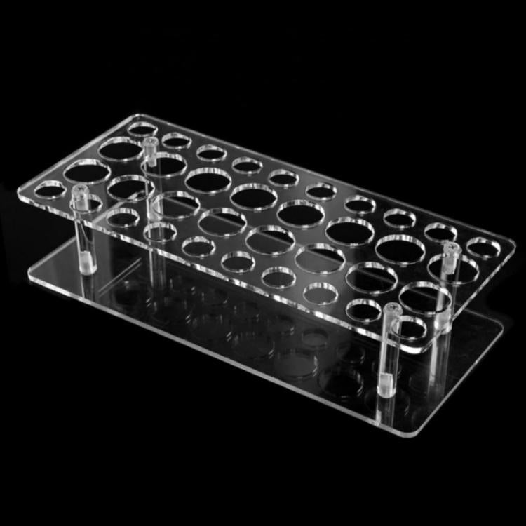 Transparent acrylic 36-hole lipstick display stand with circular openings and posts.