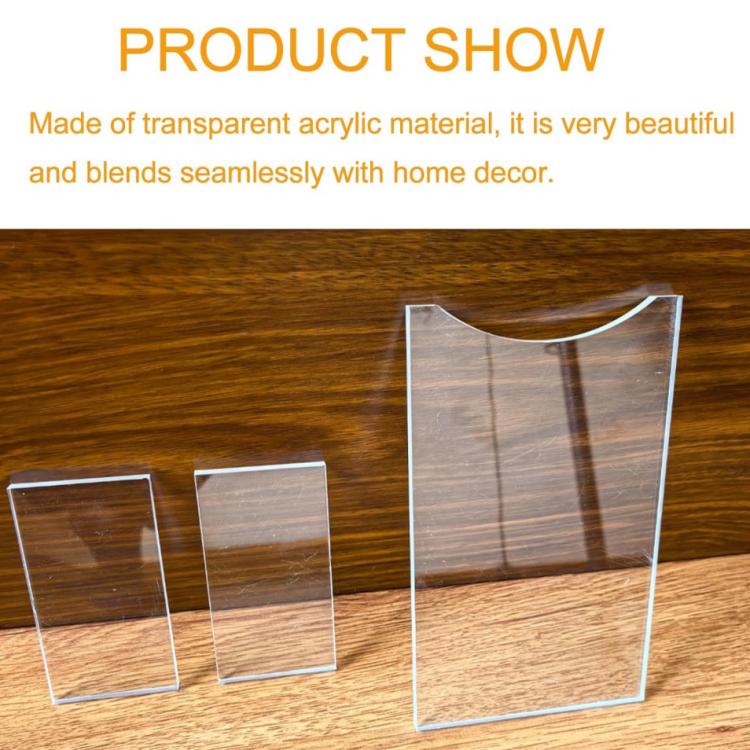 Transparent acrylic distance spacer panels with rounded top and rectangular base pieces.