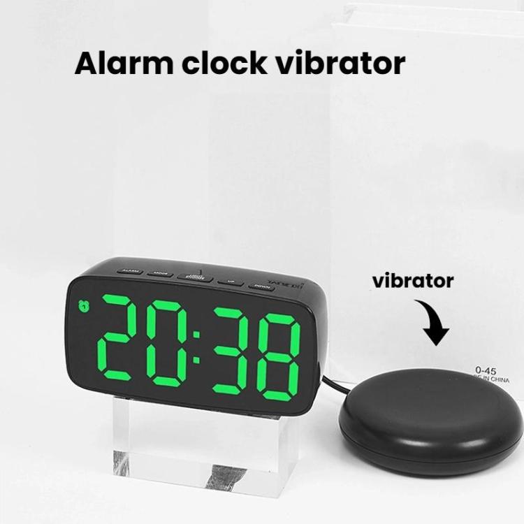 Black LED alarm clock with green light digits and round vibration alarm base.