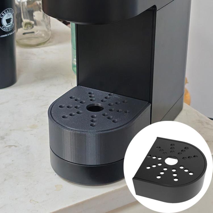 Drip tray replacement installed under coffee maker, showing perforated top surface