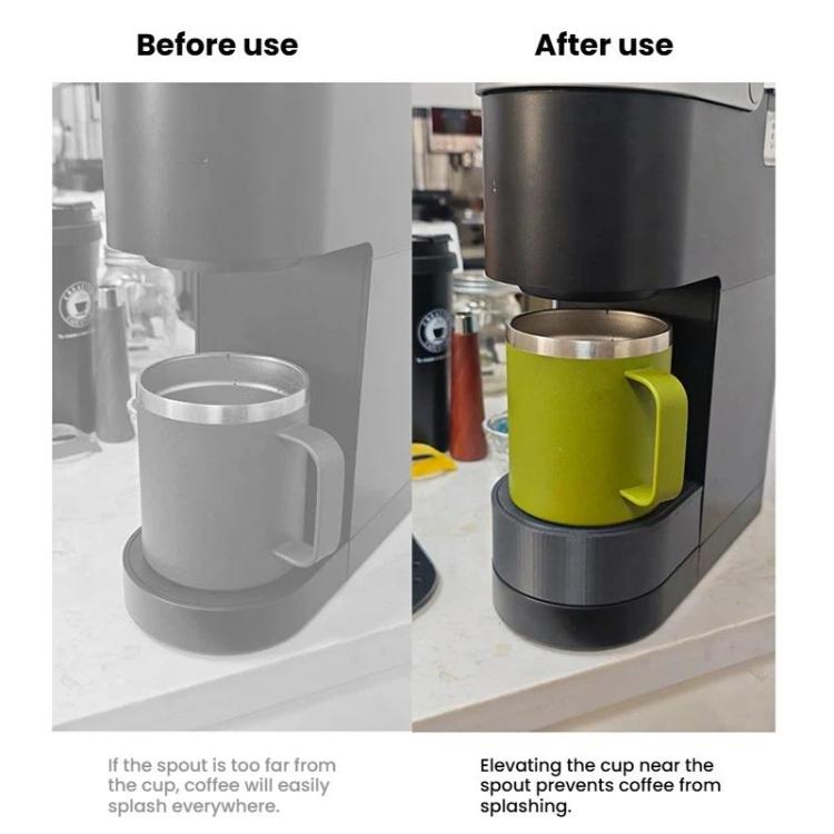 Coffee maker drip tray with cup placed near spout, showing perforated platform