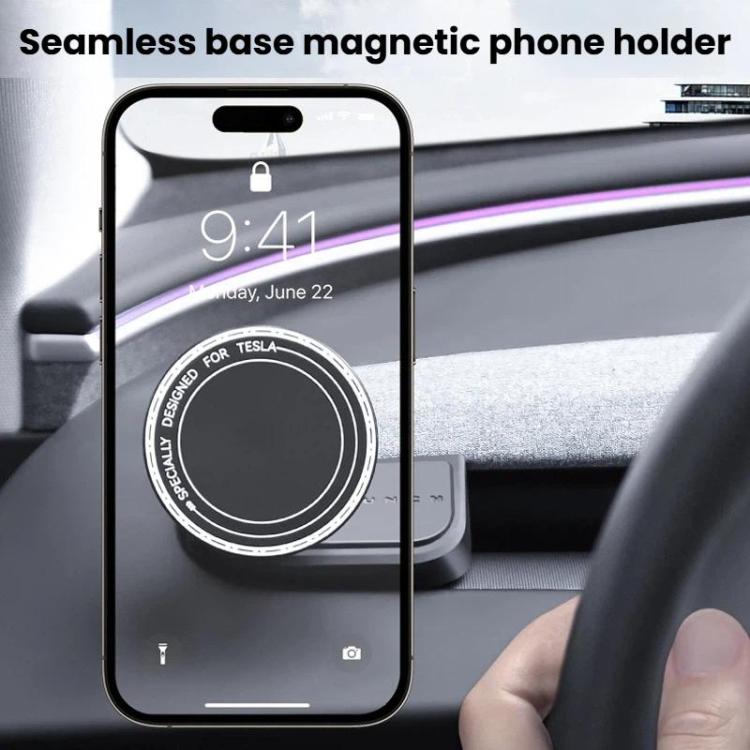 Black magnetic dashboard phone holder holding a smartphone