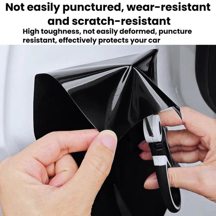 Black anti-scratch protective film, hand applying over rear inner door panel