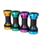 Assorted anodized bike bottom bracket cartridges in multiple colors