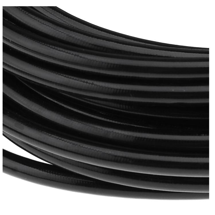 Close-up of black high-pressure hose with molded ridges and reinforced outer lines.
