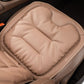 Car seat cushion pad, beige quilted surface with stitched edge and rounded corner contours