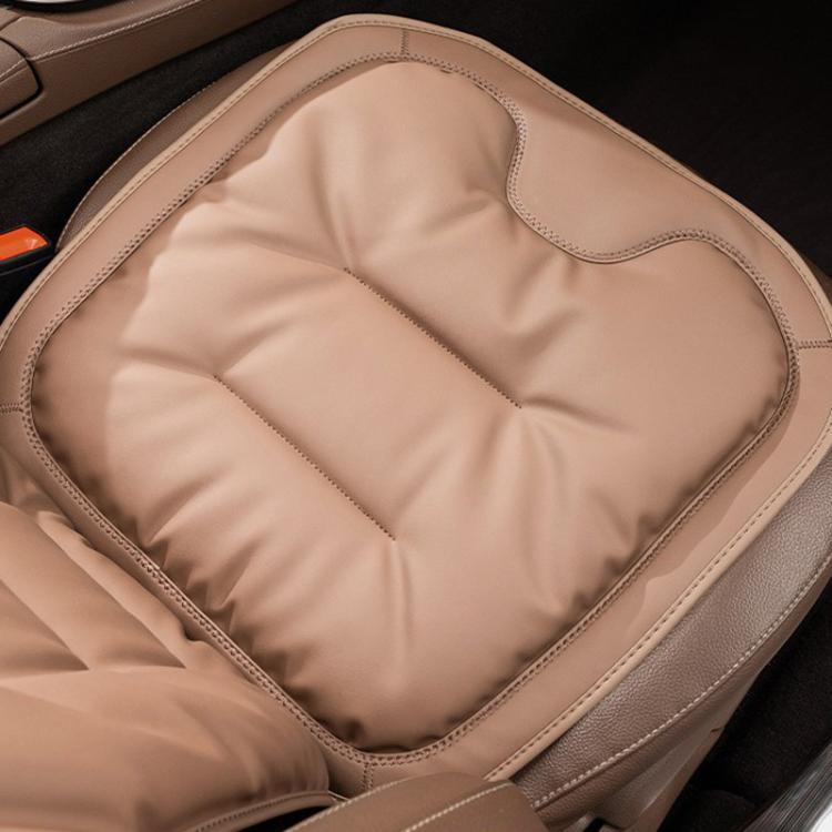 Car seat cushion pad, beige quilted surface with stitched edge and rounded corner contours