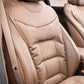 Car seat cushion pad, light beige quilted surface with stitched edge and rounded backrest area