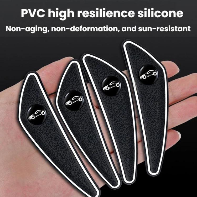 Set of four black car mirror corner protectors with textured surface and white edging