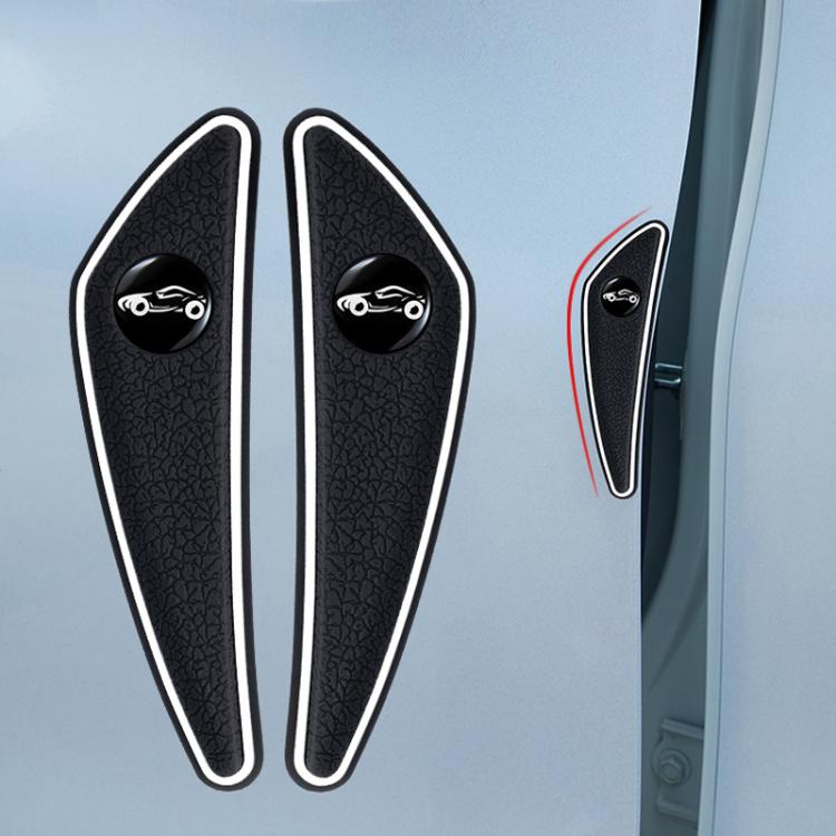 Black car mirror corner protectors with white borders, two applied on door edge