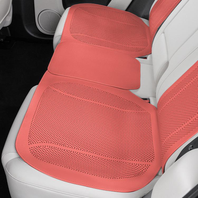 Red rear car seat cushion set with perforated breathable seat and backrest covers.
