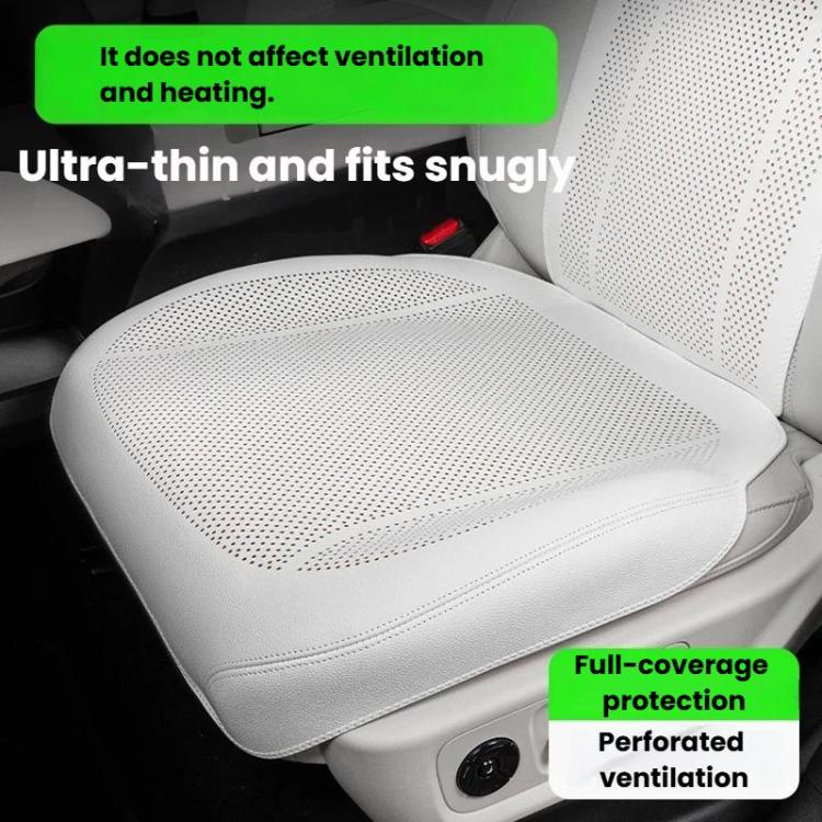 Light-colored perforated front car seat cushion with breathable ventilation holes.