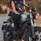 Motorcycle rider wearing black LED shoulder bag with lit front display screen