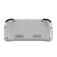White handheld game console underside with ventilation vents and bumper grips