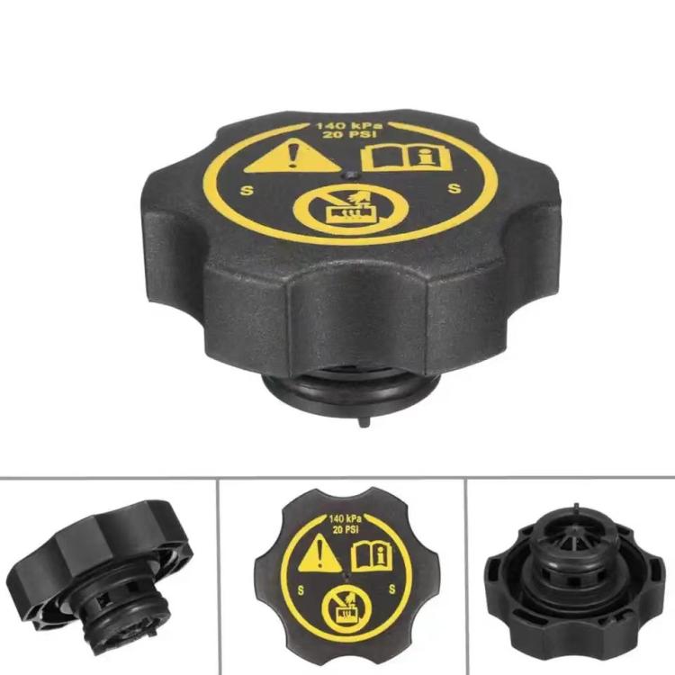 Black radiator cap top view with yellow safety label and vent