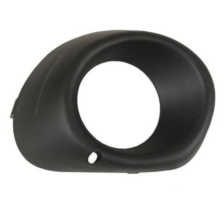 Black fog light bezel with round opening and lower mounting hole