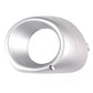 Silver fog light bezel cover with round opening and lower alignment hole