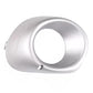 Silver fog light bezel with circular opening and side mounting clip
