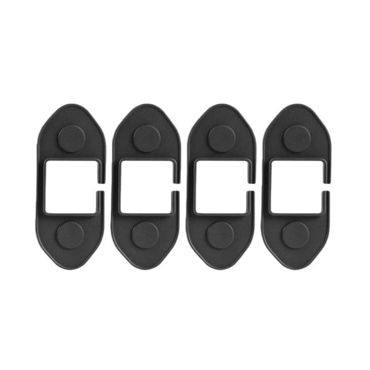 Set of four black silicone door limiter covers with arched shape and square cutout.