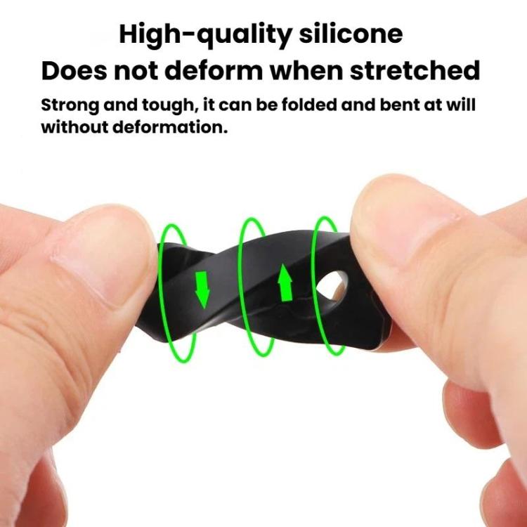 Black silicone door lock buffer pad held in hands, flexible ridged design