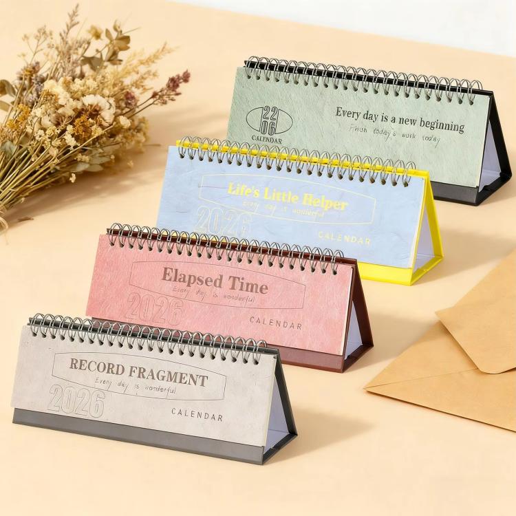Set of 2026 mini desk calendars in multiple colors with spiral rings and flip stands