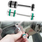 Aluminum oil steering barbell with green bushings, shown held for installation