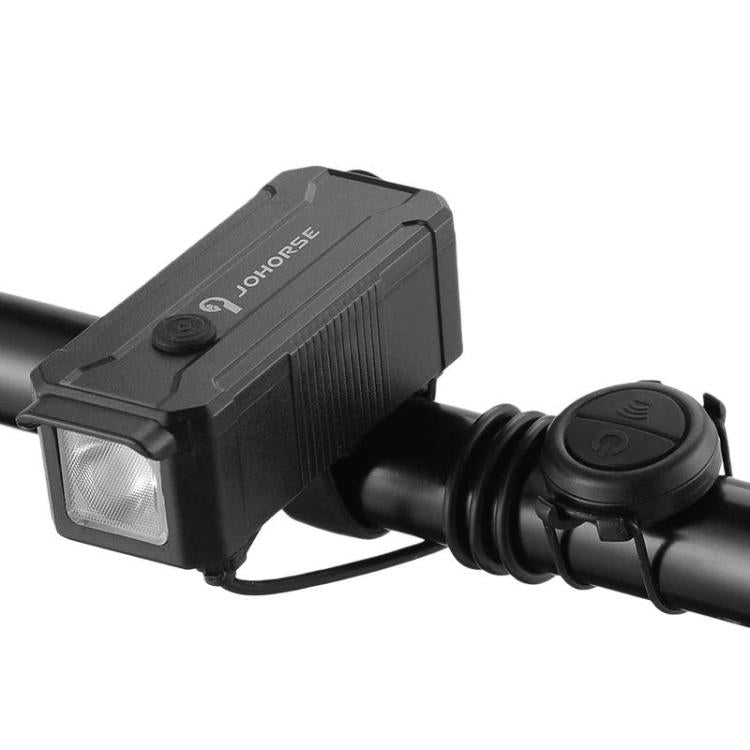 Black bicycle headlight with square front LED lens and rubber button control on cable