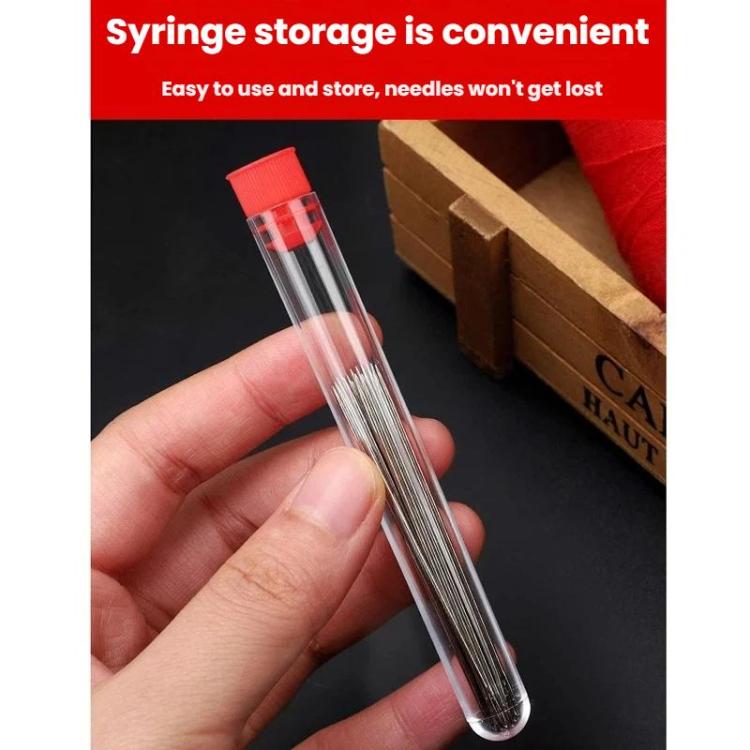 Large-hole sewing needle set stored in clear red-capped tube held in hand