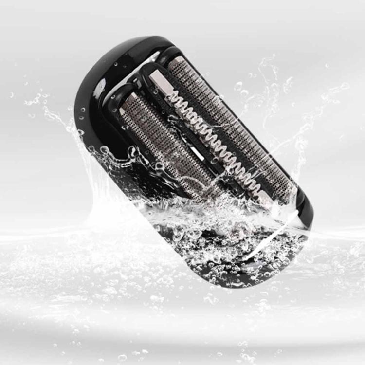 Black replacement shaver head with two foil cutters shown with water splash