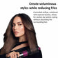 Volumizing brush attachment with rose pink top held near hair during styling