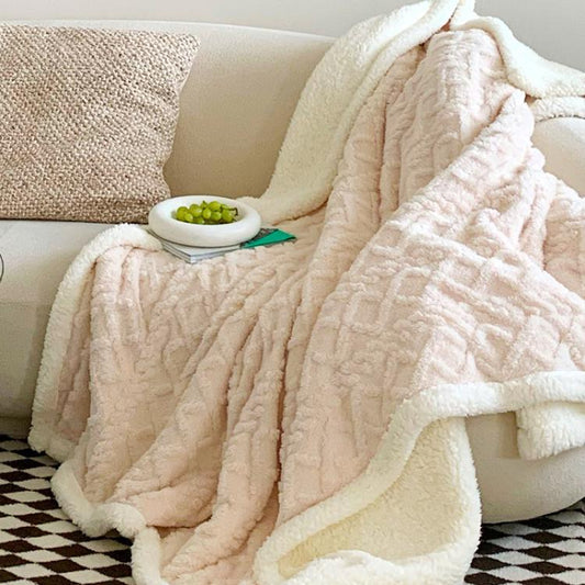 Coral-pink fleece throw blanket with thick textured pattern, soft plush border for sofa