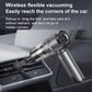 Gray cordless vacuum cleaner cleaning car seat crevices with round suction head