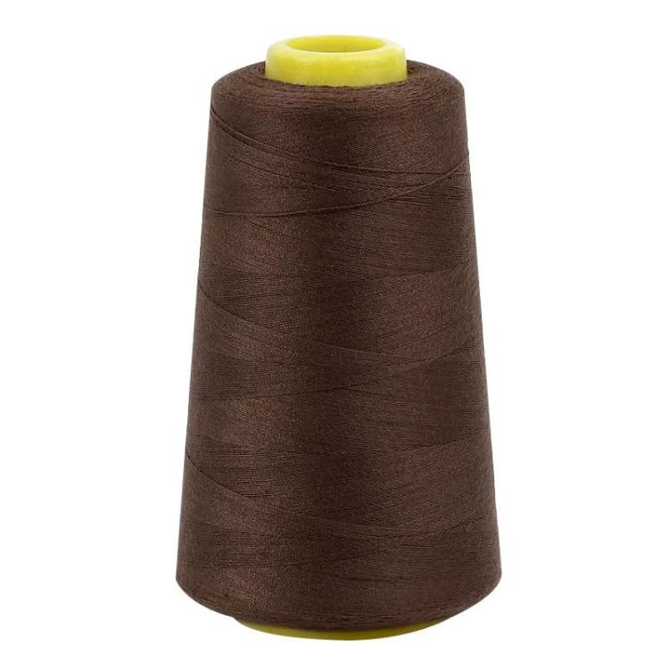Polyester sewing thread spool, brown color, fine thread wound tightly on cone