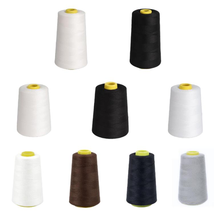 Assorted polyester sewing thread spools in white, black, brown, dark blue, and gray