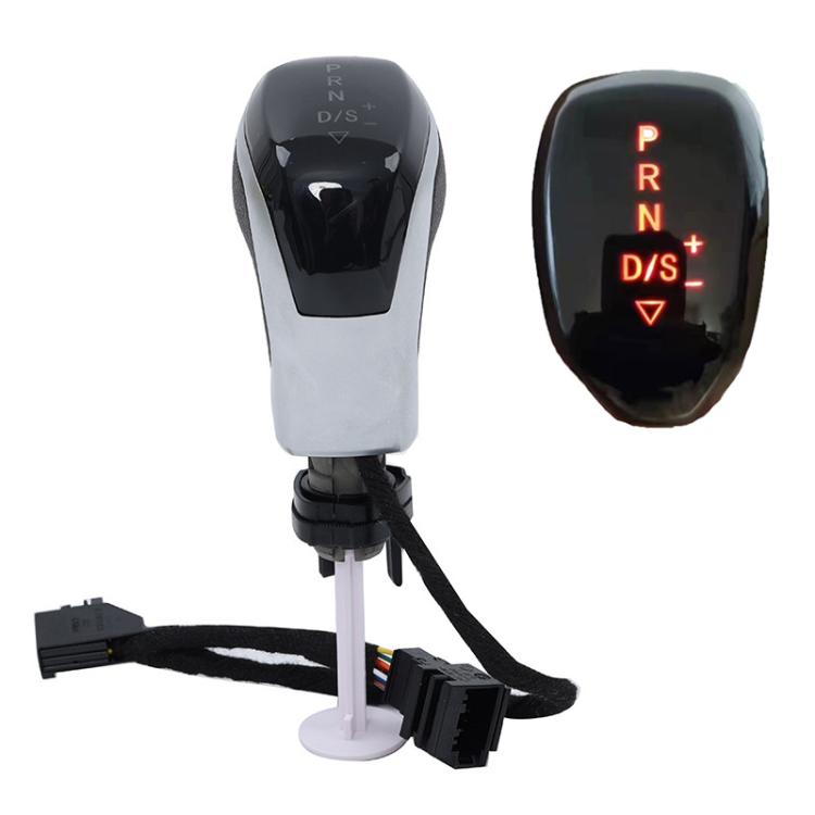 Illuminated LED gear shifter knob with red-lit shift positions, chrome top and white base