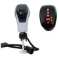 Illuminated LED gear shifter knob with red-lit gear symbols, chrome finish and white body