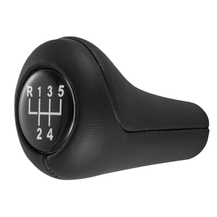 Black leather gear shift knob, angled view, with numbered shift plate and oval housing