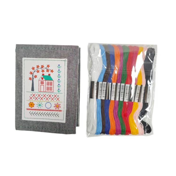 Embroidery stitch book with linen cover and bundled multicolor embroidery threads
