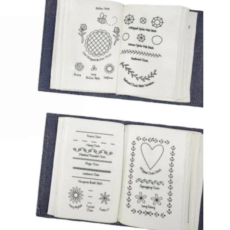 Open embroidery stitch book pages with outline stitch diagrams and hearts