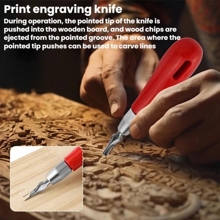 Red-handled print engraving knife carving lines into wood with metal blade tip