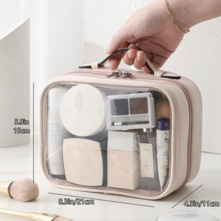 Pink transparent makeup bag with zipper closure, top handle, and neatly arranged toiletries