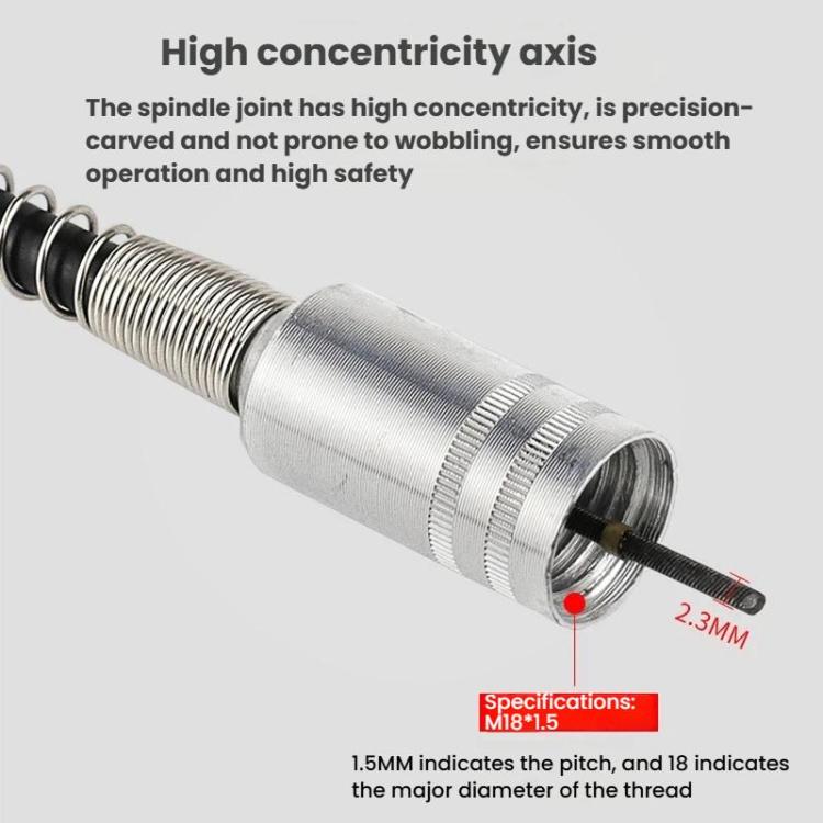 Silver flexible shaft coupler with coiled spring cover and small red indicator